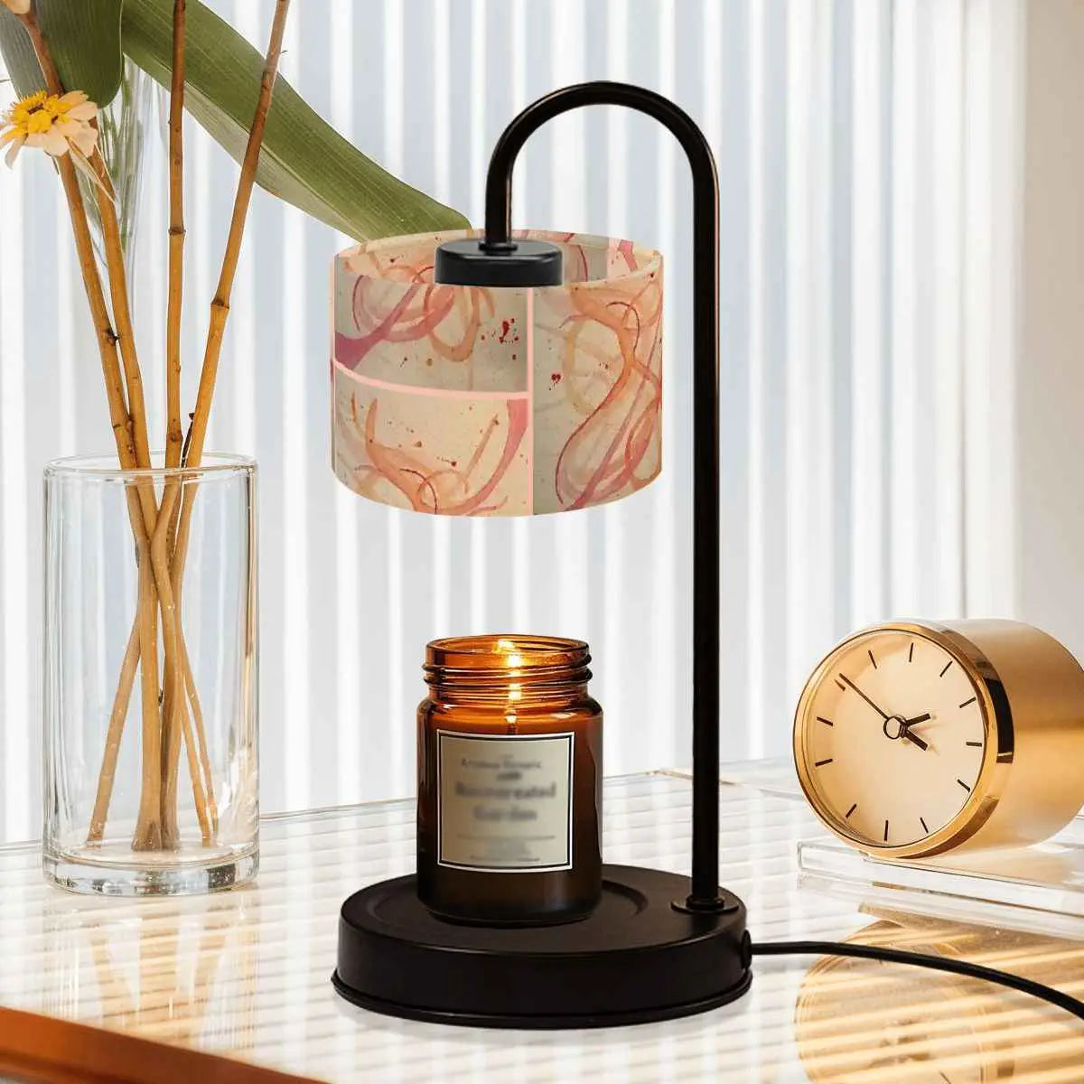 Sparkly New Year Candle Warmer Lampshade illuminating a scented candle on a modern desk.