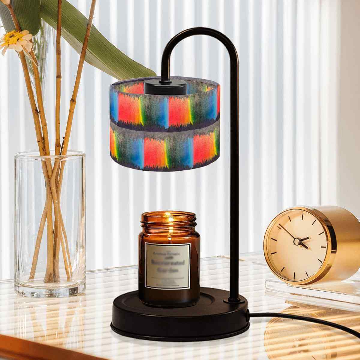 Sparkly New Year Candle Warmer Lampshade illuminating a candle on a stylish table with an elegant clock and plant.