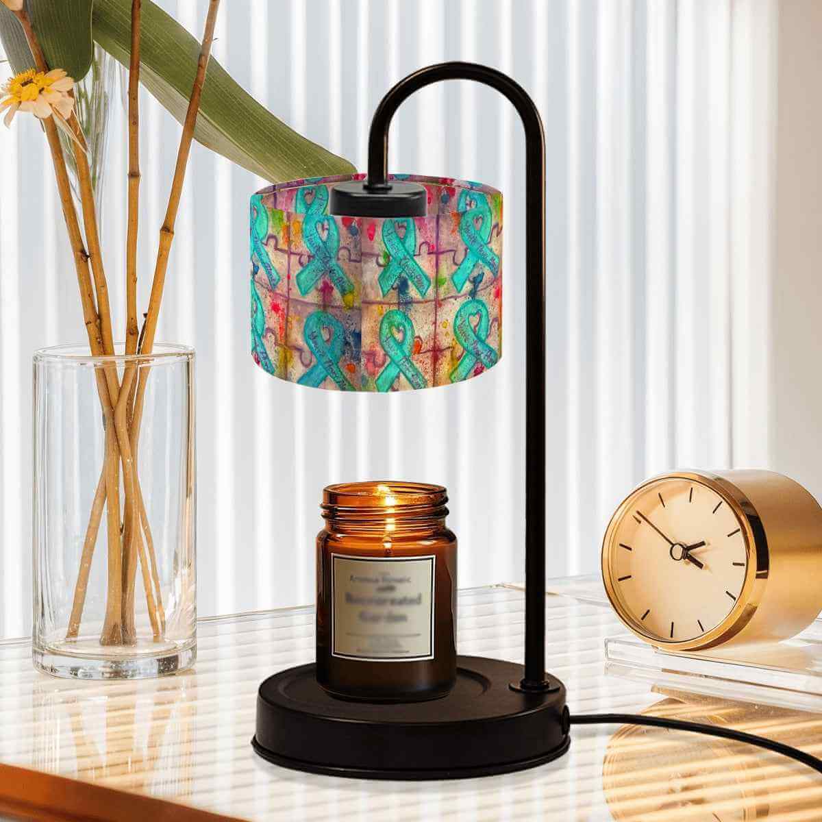 Sparkly New Year Candle Warmer Lampshade on a stylish table with a lit candle.