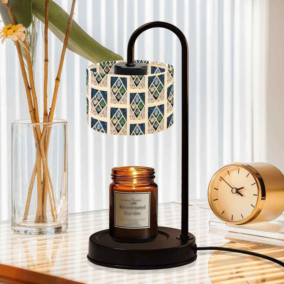 Sparkly New Year Candle Warmer Lampshade illuminating a candle on a modern table with decorative elements.