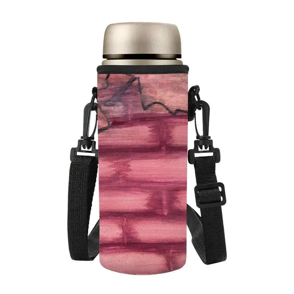 Autumn water bottle sleeve with a unique pink watercolor design and adjustable straps for easy carrying.